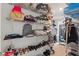 Bright walk-in closet featuring wire shelving with ample storage space for clothes, shoes, and accessories at 13765 Whiskey Daisy Dr, Dade City, FL 33525