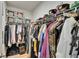Walk-in closet with wire shelving for ample storage and organization options at 1398 Crescent Hoop Way, Wesley Chapel, FL 33543