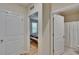 Hallway with access to a bedroom and a bathroom at 1398 Crescent Hoop Way, Wesley Chapel, FL 33543