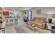 Spacious living room with open floor plan and updated kitchen at 1398 Crescent Hoop Way, Wesley Chapel, FL 33543