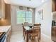 Kitchen breakfast nook with ample natural light and stylish furnishings at 15860 Aurora Lake Cir, Wimauma, FL 33598