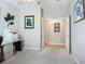 Office space with neutral walls, open doorway, and wall art creating a welcoming environment at 15860 Aurora Lake Cir, Wimauma, FL 33598