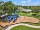 Community playground featuring multiple slides, swings, and climbing structures, perfect for active  at 17668 Bright Wheat Dr, Lithia, FL 33547