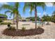 Resort-style pool area featuring a pool, spa, sundeck, and lush landscaping at 17668 Bright Wheat Dr, Lithia, FL 33547