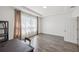 Bright, versatile room with tray ceiling, offering flexible space perfect for a home office or hobby area at 17668 Bright Wheat Dr, Lithia, FL 33547