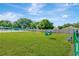 Well-maintained dog park with agility equipment and open grassy areas, perfect for pets to play and exercise at 1806 Powder Ridge Dr, Valrico, FL 33594