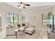 Bright living room with a comfortable sectional sofa and plenty of natural light at 1806 Powder Ridge Dr, Valrico, FL 33594