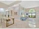 Open-concept living space with living room and dining area filled with natural light at 1806 Powder Ridge Dr, Valrico, FL 33594