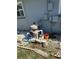 Home's pool equipment area showing pump and filtration system outside at 2198 Academy Dr, Clearwater, FL 33764