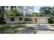 Charming single-story home with well-maintained landscaping and inviting curb appeal at 2271 Terrace N Dr, Clearwater, FL 33765