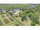 Waterfront property with a home, private dock, pool and adjacent aquaculture farm at 2309 Cypress Walk Way, Ruskin, FL 33570