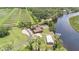 Expansive estate with a pool, outbuilding, and waterfront access at 2309 Cypress Walk Way, Ruskin, FL 33570