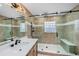 Updated bathroom featuring a glass enclosed shower, and updated vanity at 2309 Cypress Walk Way, Ruskin, FL 33570