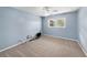 Light-filled bedroom with carpet flooring and a ceiling fan at 2309 Cypress Walk Way, Ruskin, FL 33570