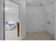 Bedroom closet with rod and shelf located off the Primary bedroom at 26338 Whirlaway Ter, Wesley Chapel, FL 33544