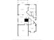 Floor plan featuring the garage, kitchen, living room, primary bedroom and bathroom, as well as a sunroom at 26338 Whirlaway Ter, Wesley Chapel, FL 33544
