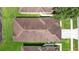 Overhead view of a home's roof in a verdant neighborhood at 26338 Whirlaway Ter, Wesley Chapel, FL 33544