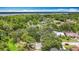 An aerial shot showcasing the property's proximity to green spaces and the surrounding area at 2973 Spring Oak Ct, Palm Harbor, FL 34684