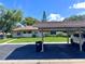 This house features covered parking, enhancing its functionality and curb appeal at 30 Tads Trl, Oldsmar, FL 34677