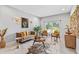 Modern living room featuring comfortable seating, stylish decor, and bright lighting at 30801 Parrot Reef Ct, Wesley Chapel, FL 33545