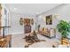 Inviting living area with comfortable seating, stylish decor, and ample lighting at 30801 Parrot Reef Ct, Wesley Chapel, FL 33545