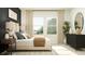 Bright and airy bedroom with large windows, neutral decor, and a cozy atmosphere at 3436 Lapis Lake Dr, Zephyrhills, FL 33541