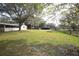 Expansive backyard showcasing ample green space perfect for recreation and outdoor activities at 3705 Bruton, Plant City, FL 33565