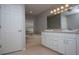Bathroom with a large vanity with dual sinks and a separate tub at 3705 Bruton, Plant City, FL 33565