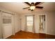 Bedroom features hardwood floors, natural light, and a ceiling fan at 3705 Bruton, Plant City, FL 33565