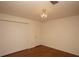 Spacious bedroom with hardwood floors and a closet with white doors at 3705 Bruton, Plant City, FL 33565