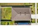 Aerial view of a home, showing the roof and backyard at 3935 Capri Coast Dr, Plant City, FL 33565