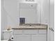 Bright bathroom with a granite vanity top, toilet, and modern fixtures at 3935 Capri Coast Dr, Plant City, FL 33565