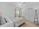 Relaxing bedroom boasts neutral walls, carpeted floor, and a ceiling fan for added comfort at 3935 Capri Coast Dr, Plant City, FL 33565