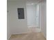 Hallway with neutral carpet leading to other rooms in the home at 400 Island Way # 1402, Clearwater Beach, FL 33767