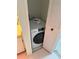 Washer and dryer laundry in closet at 400 Island Way # 1402, Clearwater Beach, FL 33767