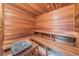 Inviting sauna room featuring natural wood benches and walls for a relaxing experience at 400 Island Way # 1402, Clearwater Beach, FL 33767