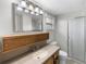 Neutral bathroom featuring a shower and vanity with ample storage at 4299 Bellaire Dr, Hernando Beach, FL 34607