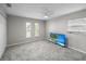 Neutral bedroom with carpeted floors, natural light, and ceiling fan at 4299 Bellaire Dr, Hernando Beach, FL 34607