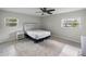 Well-lit bedroom with carpeted floors and two windows providing ample natural light at 4299 Bellaire Dr, Hernando Beach, FL 34607