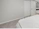 Bedroom featuring neutral walls, plush carpeting, and a closet with a pair of doors at 4299 Bellaire Dr, Hernando Beach, FL 34607