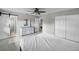 Comfortable bedroom featuring a barn door and closet for ample storage at 4299 Bellaire Dr, Hernando Beach, FL 34607
