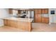 Updated kitchen features ample counter space, stainless steel appliances, and modern finishes for cooking convenience at 4299 Bellaire Dr, Hernando Beach, FL 34607