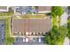 Aerial view of property with designated parking and well-maintained landscaping at 4314 La Mora Ct, Tampa, FL 33611