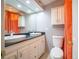 Bathroom featuring double sinks, vanity, and sleek fixtures, offering a practical and stylish space at 4314 La Mora Ct, Tampa, FL 33611