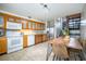 Spacious kitchen with wood cabinets, stainless steel appliances, and a dining area at 4314 La Mora Ct, Tampa, FL 33611