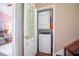 Convenient laundry closet with stacked washer and dryer for efficient space-saving at 4314 La Mora Ct, Tampa, FL 33611