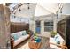 Inviting patio with comfortable seating, pavers, string lights and covered awning at 4314 La Mora Ct, Tampa, FL 33611