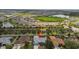 Beautiful aerial view of the property showcasing its location within the neighborhood and nearby lake at 4612 35Th E Ave, Palmetto, FL 34221