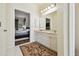 Bathroom with double vanity and a glimpse into the bedroom, promoting a luxurious ensuite feel at 4612 35Th E Ave, Palmetto, FL 34221