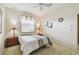 Cozy bedroom featuring natural light from the window and neutral decor at 4612 35Th E Ave, Palmetto, FL 34221